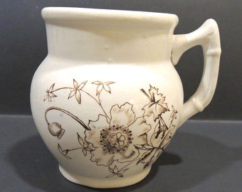 Antique Ironstone Brown And White Mug, Floral design Front And Back. Marked Monitor On The Bottom