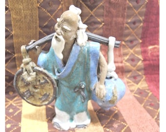 Antique Chinese, Shiwan Mud Man. Yoke With Coin And Peach