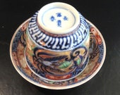 Antique Japanese Imari Arita Cup And Saucer, Hand Painted Exquisite Deep Colors And Liberal Gold, Dragon Center And Stylized Birds On Edges