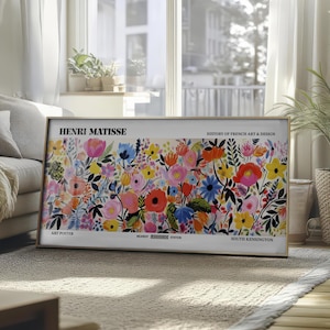 May include: A framed art poster featuring a vibrant floral design with a variety of colorful flowers. The poster includes the text "HENRI MATISSE", "HISTORY OF FRENCH ART & DESIGN", "ART POSTER", "NEAREST UNDERGROUND STATION", and "SOUTH KENSINGTON".