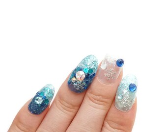Nails, winter nails, snowflakes, frozen nail art, princess nails, ice queen, Japanese nails, blue nail, white nail, snow nail, glittery nail
