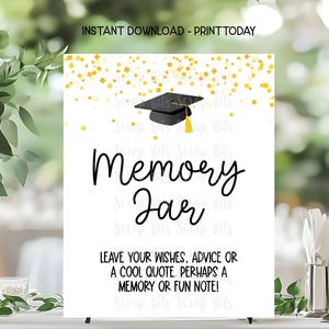 May include: A white sign with the words "Memory Jar" in black script, topped with a graduation cap illustration and gold confetti. The sign reads "Leave your wishes, advice or a cool quote. Perhaps a memory or fun note!"
