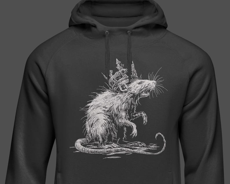 May include: Dark gray hoodie featuring a detailed white illustration of a rat wearing a crown. The rat is depicted in a regal pose, with its mouth open and whiskers visible. The hoodie has a drawstring hood.
