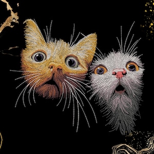 May include: An embroidered artwork on a black background featuring two cat heads with wide, surprised eyes and open mouths. One cat is rendered in shades of golden orange, while the other is in silver gray. Gold abstract line accents frame the corners.