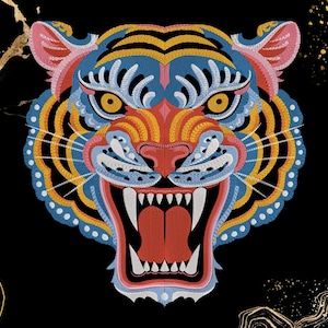 May include: An embroidered tiger head patch featuring a vibrant color palette of blue, yellow, orange, pink, and white threads. The tiger is depicted with an open mouth, bared teeth, and a red tongue, set against a solid black background.