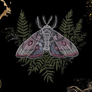 May include: An embroidered moth with detailed wings in shades of grey, pink, and blue, adorned with red eye-like markings. The moth is set against a backdrop of green fern-like leaves and a black background with gold accents.