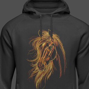 May include: A black hoodie featuring a detailed illustration of a horse's head and flowing mane. The horse's head is rendered in shades of brown, gold, and orange, creating a striking contrast against the dark background of the hoodie.