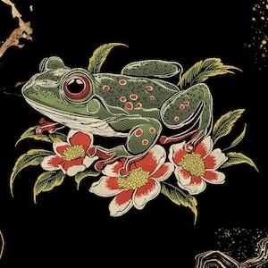 May include: An embroidered design of a green frog with red spots and eyes, positioned on red and white flowers with yellow centres and green leaves. The design is set against a black background with gold accents.