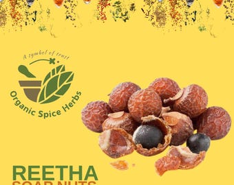 May include: Close-up of brown soap nuts, also known as Reetha, on a yellow background. The soap nuts are a natural alternative to commercial detergents.