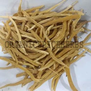 May include: A pile of dried, light brown, slender, and elongated herbs. The herbs are arranged in a dense cluster, with some pieces extending outwards. The text "ORGANIC SPICE HERBS" is visible on the image.