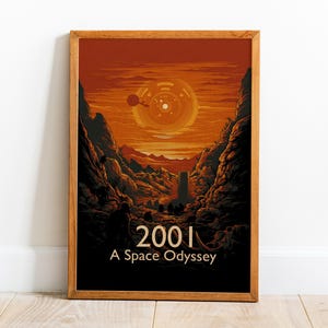 May include: A framed art print featuring a science fiction landscape with a large, circular object in the sky. The print has a warm color palette of orange, brown, and black. The text "2001 A Space Odyssey" is at the bottom.