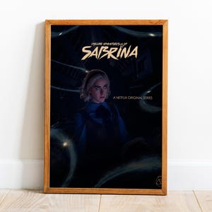 May include: A framed poster for the Netflix series "Chilling Adventures of Sabrina." The poster features a young woman with short, light-colored hair, set against a dark background with the show's title in a stylized font. The words "A Netflix Original Series" are also visible.