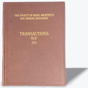 May include: A brown book titled "Transactions Vol. 87 1979" by The Society of Naval Architects and Marine Engineers. The text is in gold lettering on the cover. The book has a rectangular shape.