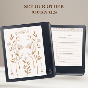 May include: A black e-reader with a white screen displaying a digital journal with the word "gratitude" and floral illustrations. The screen on the right side of the e-reader shows a calendar and a daily gratitude journal prompt.