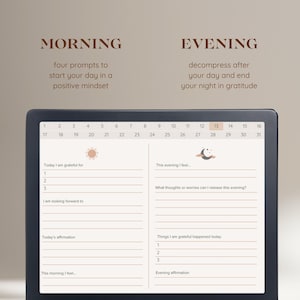 May include: A digital calendar on a laptop screen with a daily gratitude journal for morning and evening. The calendar shows the month of July with a sun icon for the morning and a moon icon for the evening.