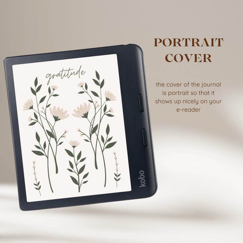 May include: A black and white e-reader with a white background displaying a floral design with the word "gratitude" on the screen. The e-reader is tilted slightly to the right and the word "kobo" is visible on the side.