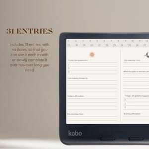 May include: A black and white e-reader with a brown and white screen displaying a 31-day gratitude journal with prompts for each day. The screen shows a sun icon, a moon icon, and the text "Today I am grateful for", "This evening I feel", "I am looking forward to", "Today's affirmation", "This morning I feel", "Things I am grateful happened", and "Evening affirmation". The e-reader has the word "kobo" printed on the bottom.