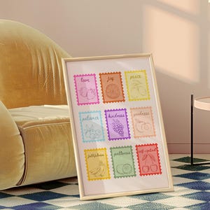 May include: A framed print with nine colorful squares, each featuring a fruit and a word. The words are "love", "joy", "peace", "patience", "kindness", "goodness", "faithfulness", "gentleness", and "self-control".