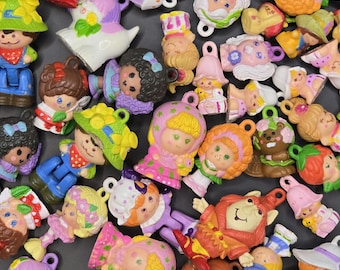 Charmkins Dufti, various vintage Hasbro figures, dolls