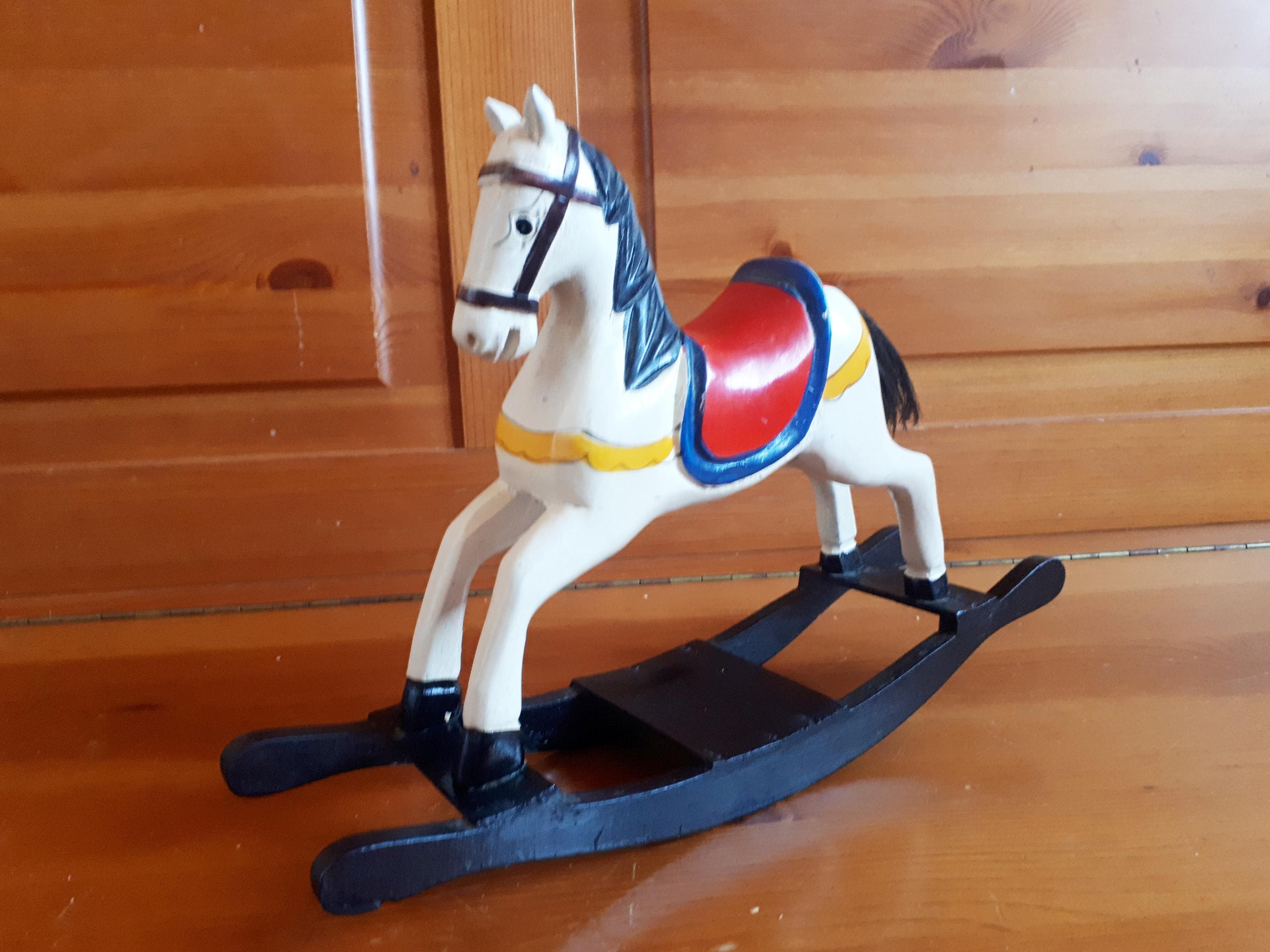 Cheval a bascule dans jouets et jeux anciens