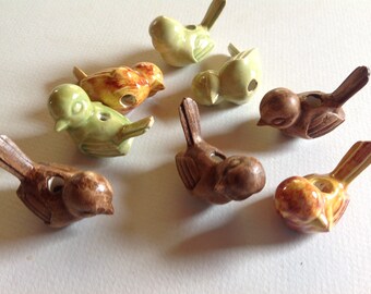 Eight ceramic birds