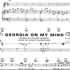 May include: Sheet music for the song "Georgia On My Mind" by Hoagy Carmichael. The music is written in the key of G major and features a melody that is both simple and memorable. The lyrics are about the state of Georgia and its people.