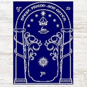 May include: A cross-stitch pattern on a dark blue background. The design features an arched doorway with the text "Speak, Friend, and Enter" in white. Decorative elements include stars, a crown, and stylized trees.