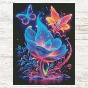 May include: A vibrant blue flower with glowing pink and orange accents, surrounded by green leaves and two butterflies. One butterfly is blue and the other is orange.