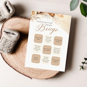 Carte de bingo pour bébé baby shower beige, couleur crème, neutre entre les hommes et les femmes, décoration florale bohème, modèle moderne modifiable | TPL025