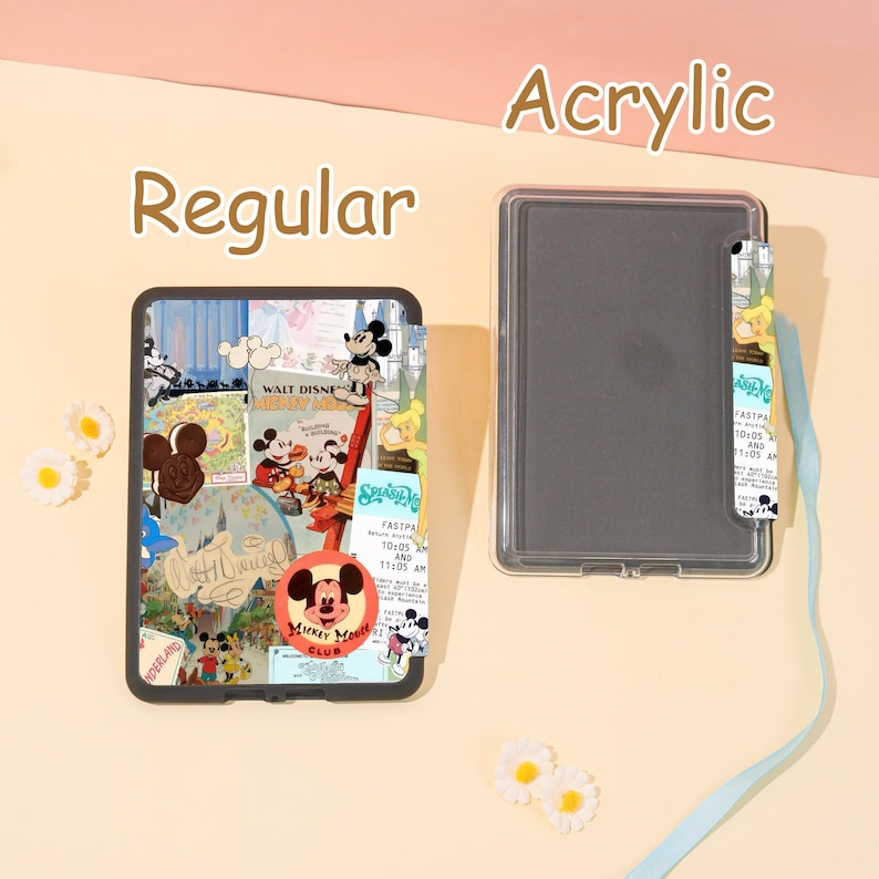 May include: A clear acrylic case with a colorful collage design featuring Mickey Mouse and other Disney characters. The case is shown next to a clear, empty case. The word "Regular" is above the case with the design, and the word "Acrylic" is above the empty case.