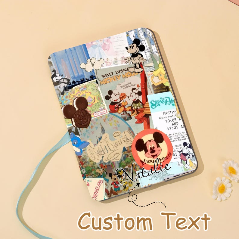 May include: A rectangular phone case featuring a collage of vintage Mickey Mouse imagery. The design includes images of Mickey Mouse, Minnie Mouse, and other Disney characters, with the text "WALT DISNEY MICKEY MOUSE" and "Custom Text". A light blue ribbon is attached.