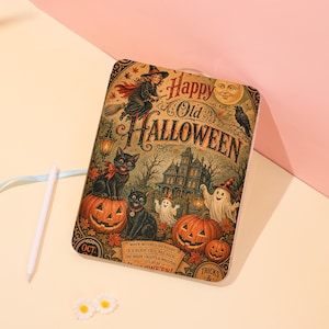 May include: A rectangular notebook featuring a vintage-style Halloween illustration with the text Happy Old HALLOWEEN. The design includes a witch on a broom, black cats, pumpkins, ghosts, a haunted house, a moon, and a raven on a tan background.