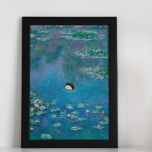 May include: Framed art print featuring a whimsical frog in a pond, inspired by Monet's water lilies. The artwork showcases a vibrant blue and green color palette with a cartoon frog in the water. The black frame adds a classic touch.