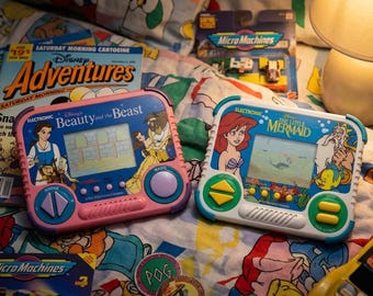 Vintage Tiger Electronics 101 Dalmatians LCD Handheld Game, 90s
