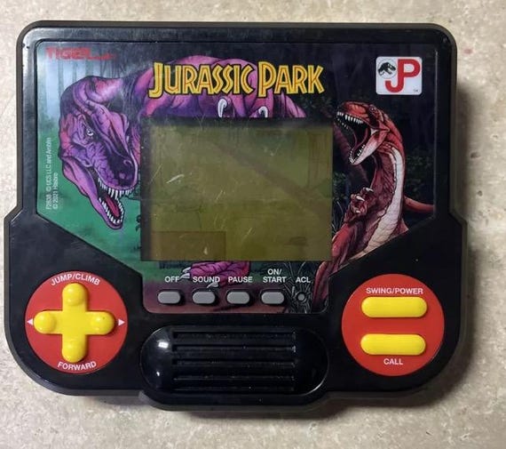 Vintage Tiger Electronics Handheld LCD Games 101 Dalmations, Jurassic Park, Alladin, Snow White, The Little Mermaid & More