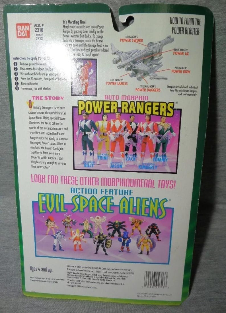 May include: Back of a Power Rangers toy package featuring the Power Rangers team, including Billy, Trini, Jason, Zack, Kimberly, and Tommy. The package also shows Evil Space Aliens action figures and instructions.
