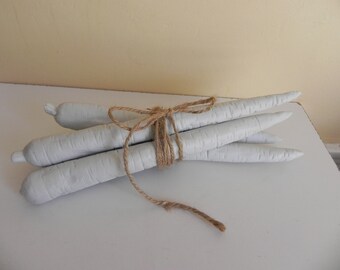 unglazed white porcelain carrots, faux food, photo prop