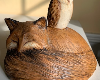 curious owl and sleeping fox animal stack, totem sculpture