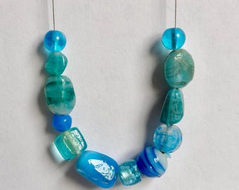 Bright blue handmade glass beaded necklace; recycled glass color statement