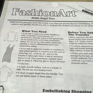 The image is a page from a fashion art book, featuring various fashion items such as dresses and shirts, along with instructions on how to transfer patterns onto fabric.