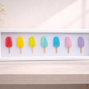 Decoración de pared con diseño de paleta de helado arcoíris en tonos pastel – Marco de resina 3D con forma de paleta – Decoración moderna y colorida para el hogar – Idea de regalo única