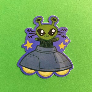 Naklejka winylowa „Uroczy obcy kot” 2,5&quot;