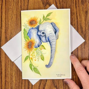 Cartão de felicitações com elefantes e girassóis, cartão com impressão em aquarela e lápis de cor