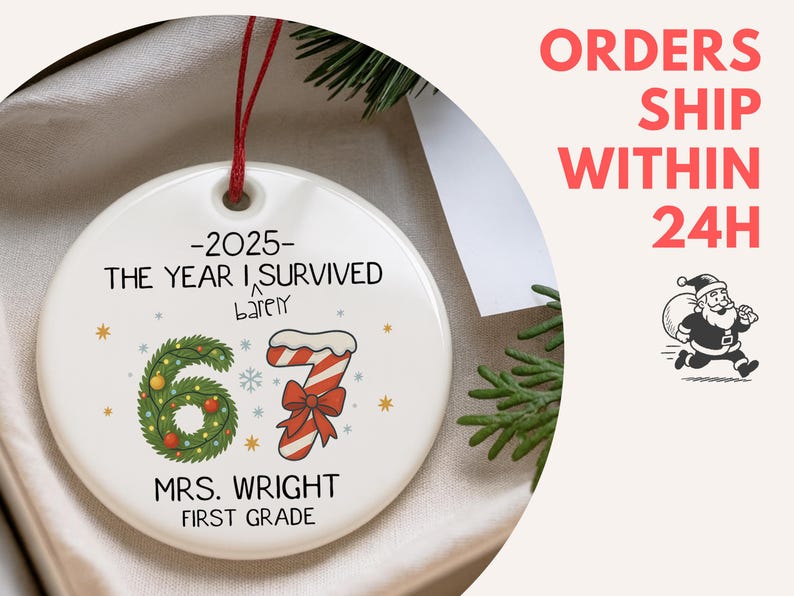 May include: A white ceramic Christmas ornament with a red string. The ornament features the text "-2025- THE YEAR I SURVIVED barely" and "MRS. WRIGHT FIRST GRADE". It has a green wreath and a candy cane design with the number "67".