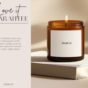 a brown glass jar with a lit candle inside, placed on top of a white book. The text overlay on the image reads "Love it GUARANTEE Simply Lit."