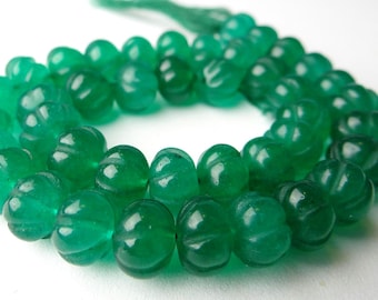 5.75 inches...Carved green onyx carved melon beads ...8x7mm