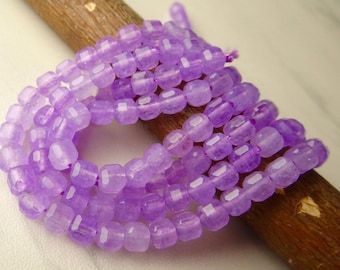 6 inches..Bright Lavender quartz faceted cube beads...5mm