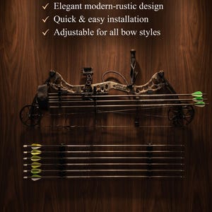 May include: A wall-mounted archery display featuring a compound bow and six arrows with green and white fletching. The text reads: The Ultimate Archery Display, Elegant modern-rustic design, Quick & easy installation, Adjustable for all bow styles, PREMIUM MOUNTS.