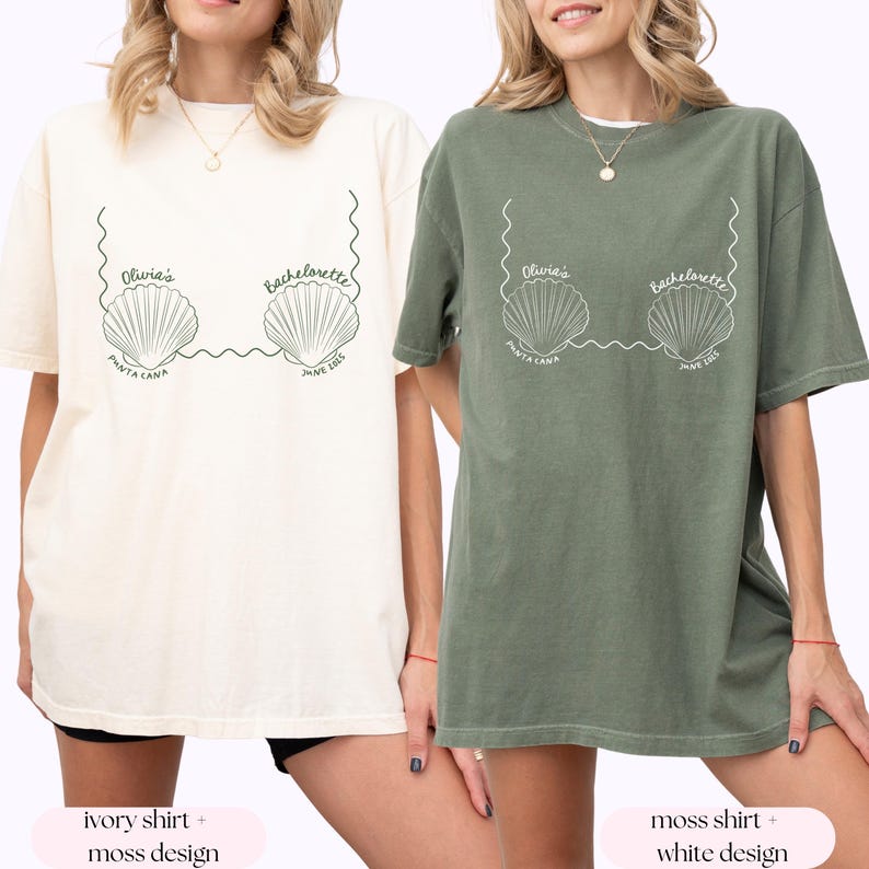 May include: Two t-shirts with a shell design. The shirt on the left is ivory with a moss green design. The shirt on the right is moss green with a white design. Both shirts say "Olivia's Bachelorette Punta Cana June 2025".