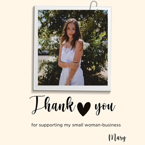 May include: A woman in a white dress stands in front of a green bush. The image is in a white frame with a silver clip at the top. The text "Thank you" with a black heart in between the words is below the image. The text "for supporting my small woman-business" is below the text "Thank you". The name "Mary" is at the bottom of the image.